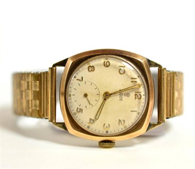 Lot 14 - A 9ct gold cushion shaped wristwatch, signed Tudor