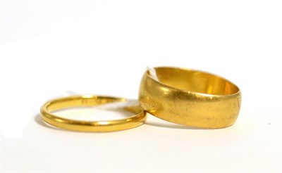 Lot 17 - Two 22ct gold band rings