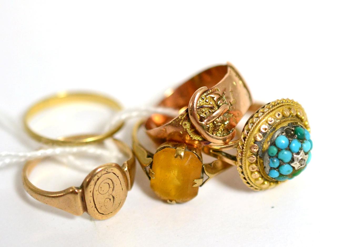 Lot 19 - A 9ct gold buckle ring, a 9ct gold signet ring, a 9ct gold band ring, a paste set ring and a...