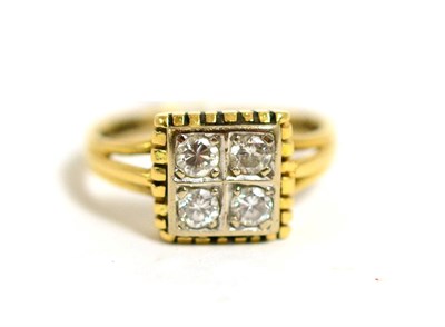 Lot 35 - An 18ct gold diamond four stone ring, round brilliant cut diamonds in yellow claw settings to a...