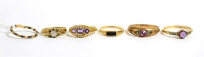 Lot 55 - An elephant hair ring, a 9ct gold amethyst and seed pearl ring, a 9ct gold onyx ring, a sardony and