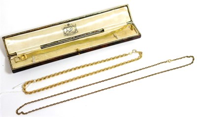 Lot 73 - A 9ct gold rope chain necklace, a Prince of Wales chain and a gilt metal buckle pattern mesh...