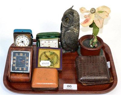 Lot 86 - A novelty flower timepiece, six travel timepieces, one signed Jaeger and a white metal owl case
