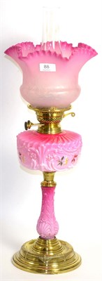 Lot 88 - Pink opaline oil lamp and shade