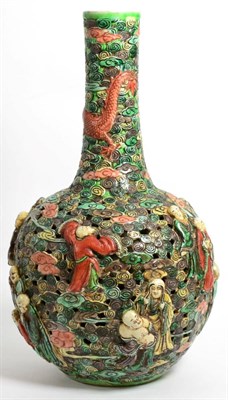 Lot 91 - A Chinese famille verte reticulated bottle vase, six character mark