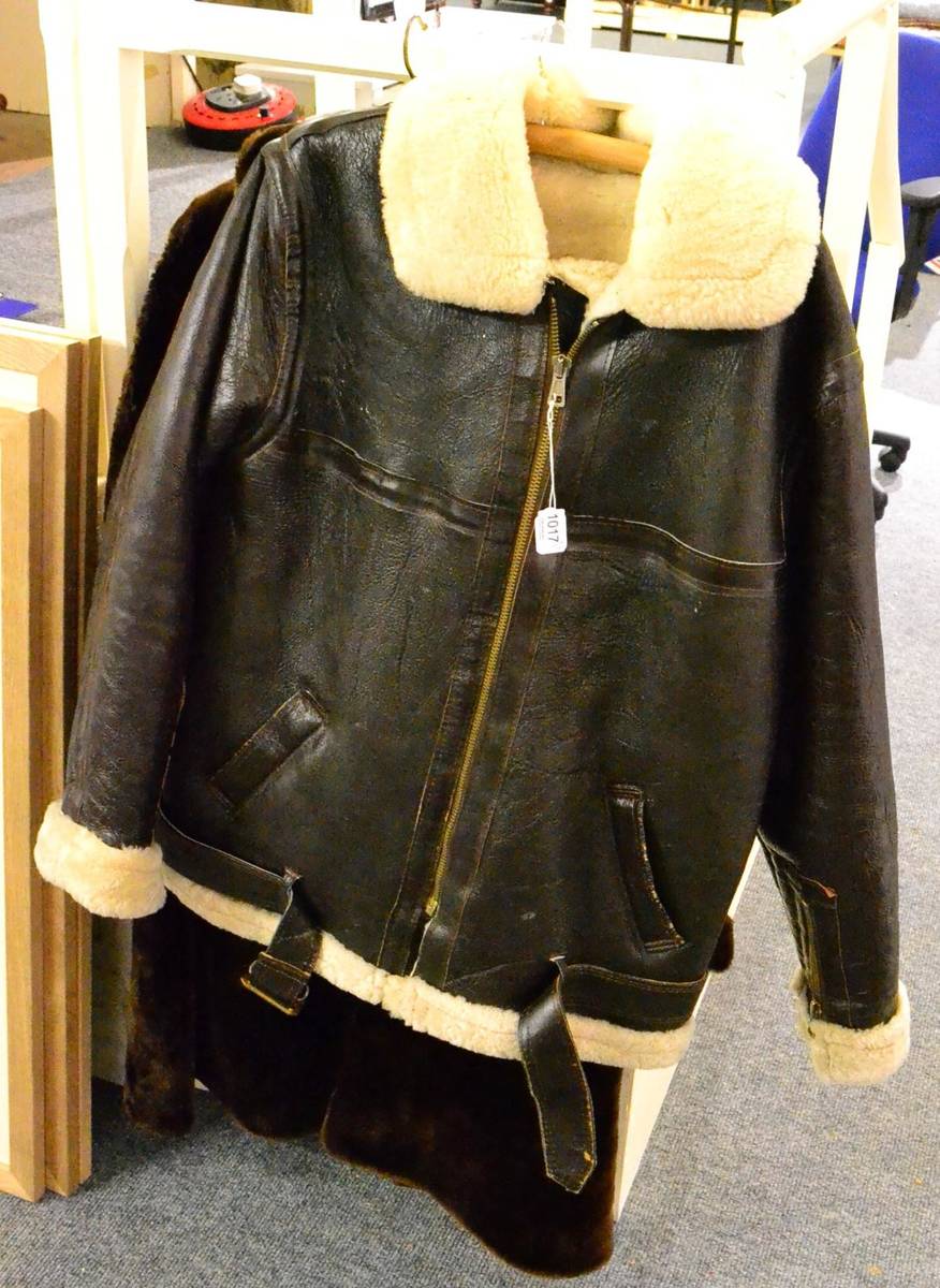 Lot 1017 - Sheepskin flying jacket, beaver lamb coat and fur stole (3)