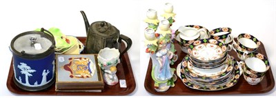 Lot 12 - Two trays of decorative ceramics including a tea set, figural candlesticks, tiles, Wedgwood biscuit