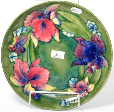 Lot 24 - A Walter Moorcroft orchid and spring flowers dish