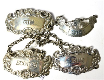 Lot 48 - Three wine labels, stamped '925' and a silver wine label (4)