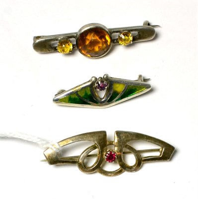 Lot 74 - Three Art Nouveau silver and stone set brooches by Charles Horner