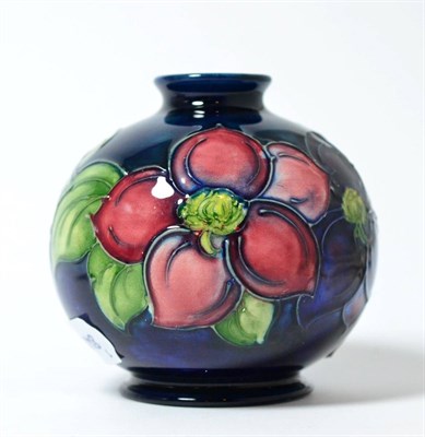 Lot 113 - A Walter Moorcroft Clematis patterned globular vase