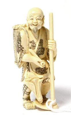 Lot 115 - An early 20th century okimono of a farmer