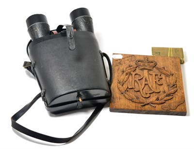 Lot 126 - A pair of Bausch and Lomb military binoculars, a RAF carved oak wall plaque and a bible