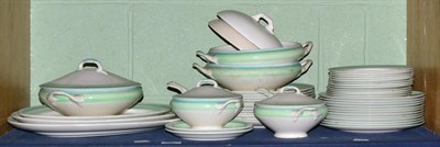 Lot 132 - A Gray's pottery green banded part dinner service, comprising three graduating meat plates,...