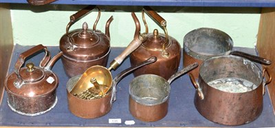 Lot 135 - Three copper kettles and four brass pans, etc