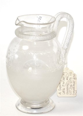 Lot 159 - A late 19th century engraved ice compartment jug