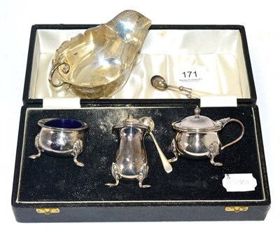 Lot 171 - A three piece silver condiment set with a spoon, two mother of pearl handled spoons and a...