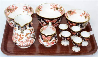 Lot 174 - A pair of Royal Crown Derby Imari sugar bowls and a smaller example, two jugs and a set of five egg