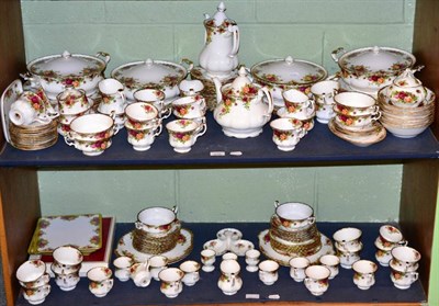 Lot 235 - A Royal Albert Old Country Roses pattern tea service on two shelves