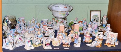 Lot 248 - A quantity of Continental Fairings figures and a Continental cherub table centrepiece