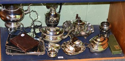 Lot 249 - A large quantity of silver plated wares including a spirit kettle and stand; teasets, entree...