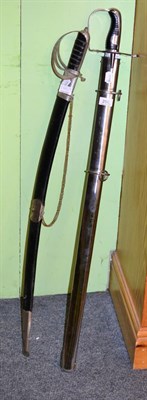 Lot 250 - A copy of a 1796 pattern heavy cavalry sword and an Indian sword