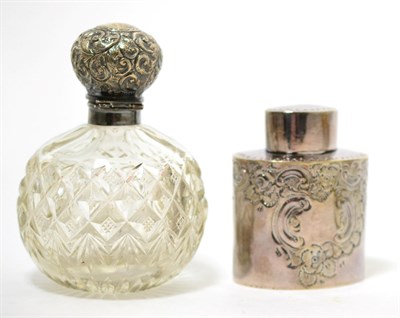 Lot 261 - A Victorian silver tea caddy, Sheffield 1893 and a silver topped scent bottle, Birmingham 1899