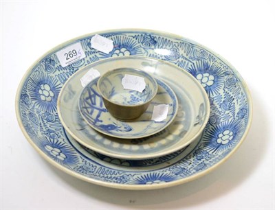 Lot 269 - A Chinese porcelain Tek Sing Cargo saucer dish, teabowl and saucer and a large provincial...