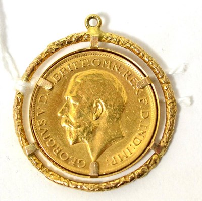 Lot 279 - A George V 1913 sovereign in frame