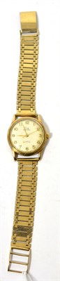 Lot 290 - A 9ct gold wristwatch signed Record on a 9ct gold bracelet