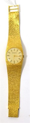 Lot 303 - A lady's wristwatch stamped '18CT' and '750'