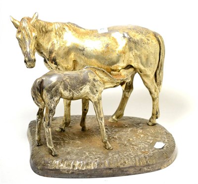 Lot 330 - A 1960s Russian white metal model of a mare and foal