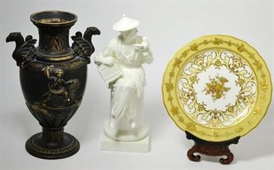 Lot 334 - Royal Worcester white glazed china figure, 'L'oiseau' Derby porcelain cabinet plate with wood stand