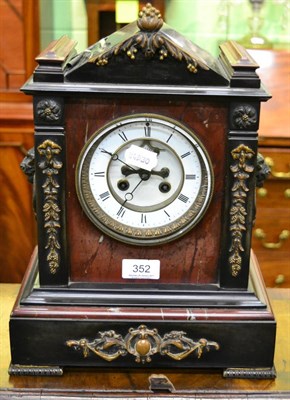 Lot 352 - A black slate and marble striking mantel clock