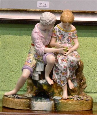 Lot 354 - A Continental porcelain figure group with faux Meissen marks to the base