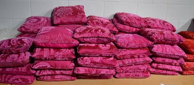 Lot 1008 - Fifty three pink shot silk cushions