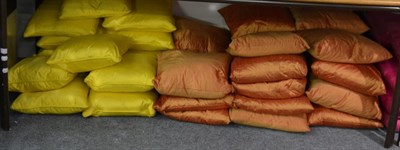 Lot 1010 - Fourteen yellow shot silk cushions and twenty three bronze shot silk cushions (qty)