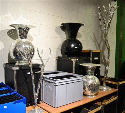 Lot 1019 - Black mirror mosaic vases, two silver examples, two grey crates containing black acrylic plates and