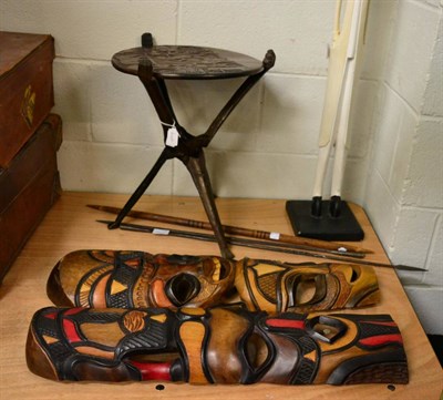 Lot 1053 - A small collection of modern ethnographica including: a drum, spear, stool, table, figure and...