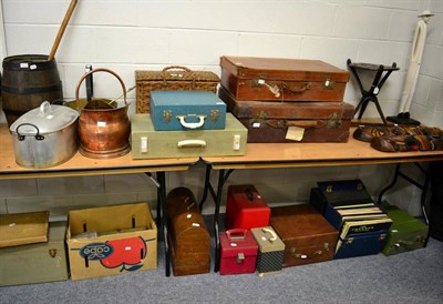 Lot 1054 - Two vintage leather suitcases, a wicker fishing creel, two picnic hampers, a fish kettle, jam...