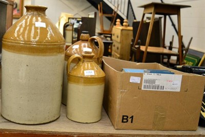 Lot 1084 - A box of books and stoneware jars