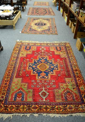 Lot 1090 - An Afshar Rug, south East Iran, the tomato red field centred by a stepped medallion framed by...