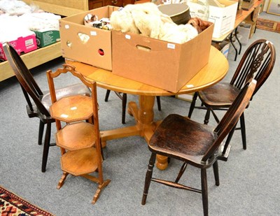 Lot 1101 - A set of four oak framed Windsor style kitchen chairs and an oak folding cake stand (5)