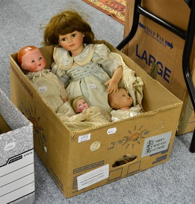 Lot 1113 - Box of dolls including an Armand Marseille bisque doll