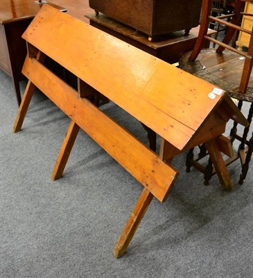 Lot 1114 - A pine framed saddle rack