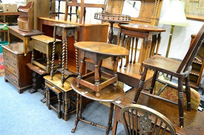 Lot 1123 - A group of oak furniture; including a stool, a plant stand, two nests of tables, three...