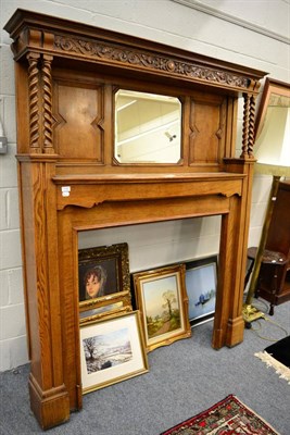 Lot 1126 - An oak fireplace