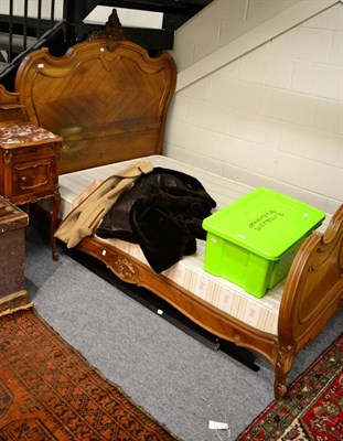 Lot 1134 - A French kingwood double bedstead and a similar marbled top bedside cabinet (2)