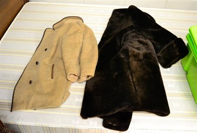 Lot 1135 - A beaver fur full length coat by Tescan and a camel coat