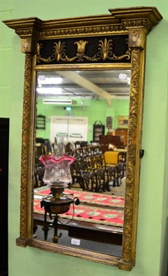 Lot 1200 - A 19th century ebonised and gilt wood wall mirror&nbsp